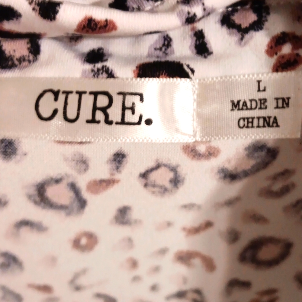 Cure sz large sleeveless blouse